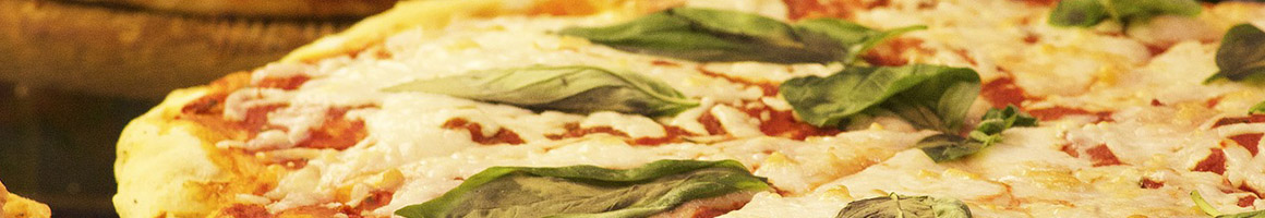 Eating Pizza at Mirano Grill and Pizza restaurant in Providence, RI.